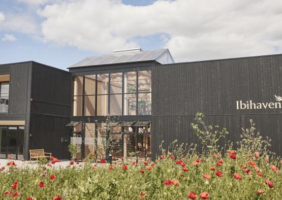 a building with flowers in front of it