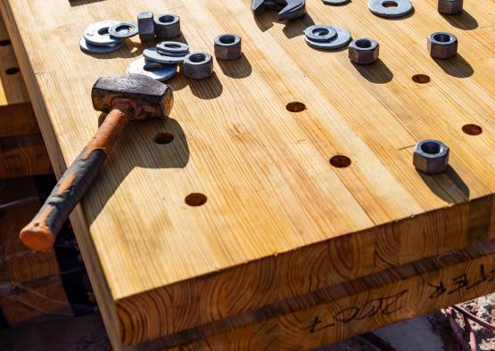 a wooden board with tools on it