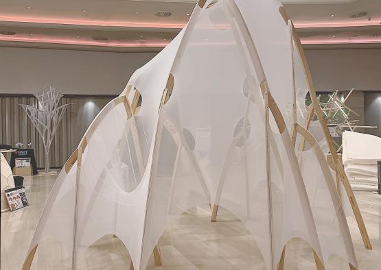 a white tent in a room