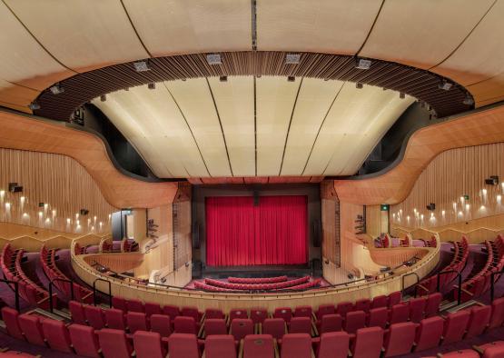 a theater with red curtains