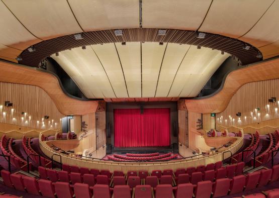 a theater with red curtains