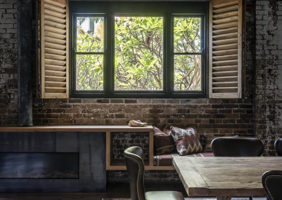 a room with a table and chairs