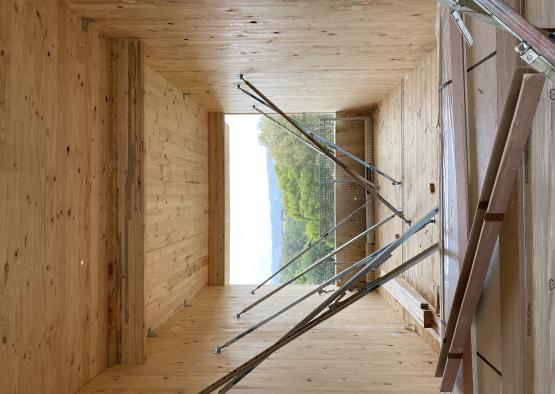 a wood floor with metal rods in it