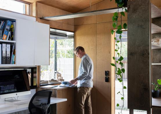 a man standing in a kitchen