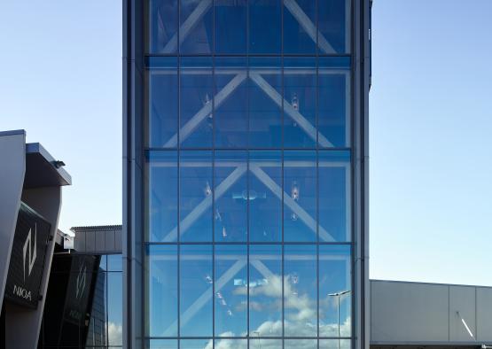 a tall building with glass windows