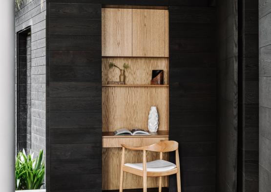 a chair and a desk in a room