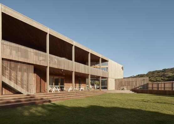 a building with a lawn and a lawn