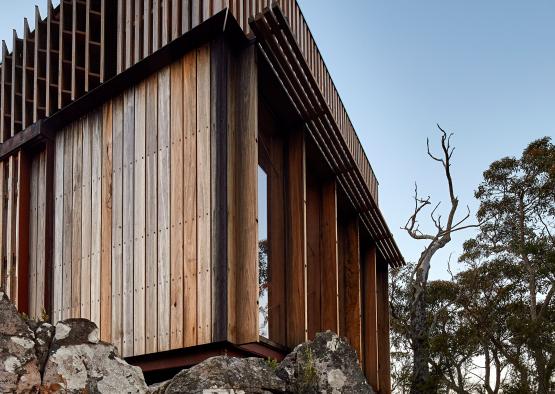 a building on a rocky hill