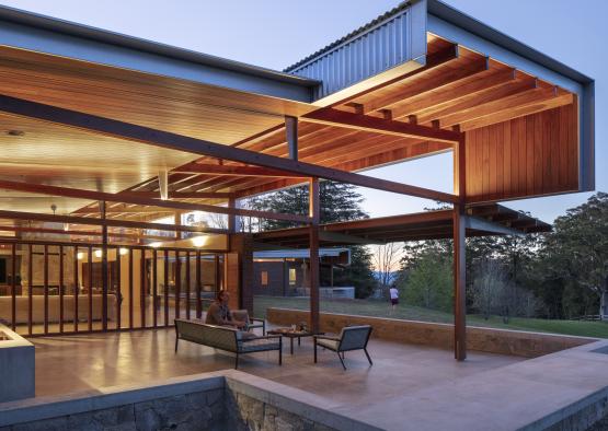 a building with a roof and a bench