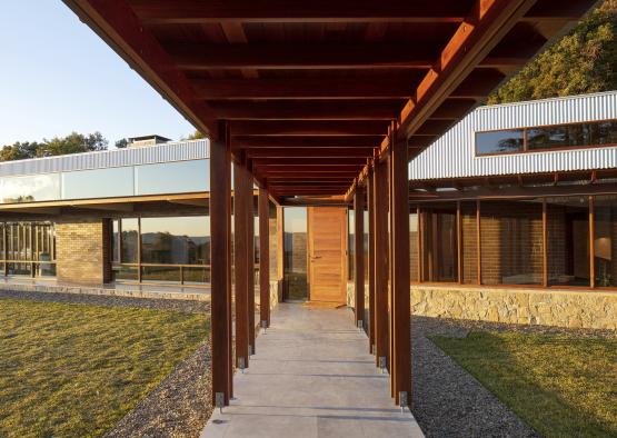 a walkway with a wooden structure