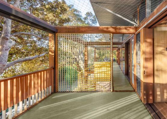 a wooden porch with a gate