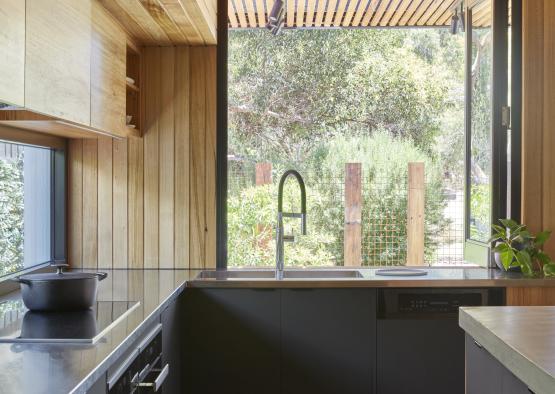 a kitchen with a large window