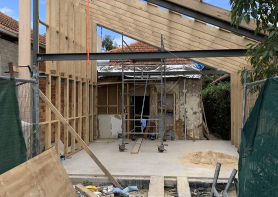 a building under construction with a scaffolding