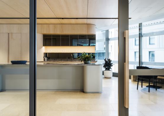 a kitchen with a glass door