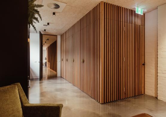a hallway with wood panels