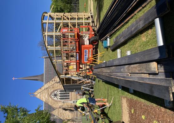 a construction site with a church and a building