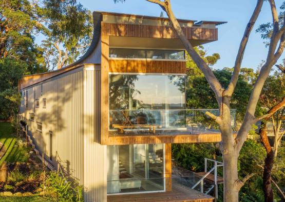 a house with a glass balcony