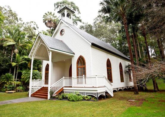 a white church with a bell tower