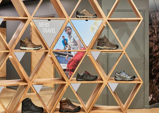 a display of shoes on shelves