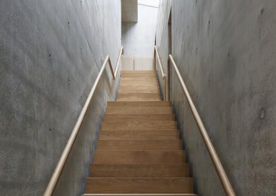 a wooden stairs in a building