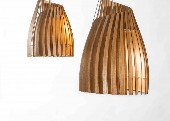 a pair of wooden lamps