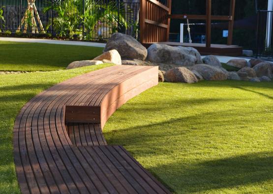 a wooden bench in a park