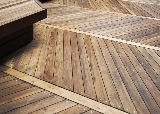 a wooden deck with benches