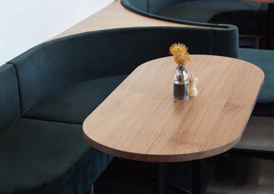 a table with a vase of flowers on it