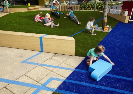 a group of kids playing in a playground