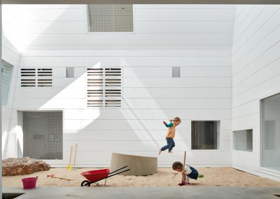 a group of kids playing in sand