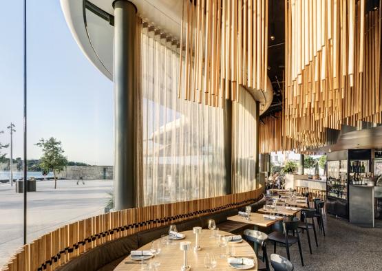 a restaurant with tables and chairs