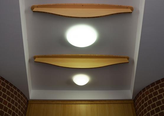 a wooden shelf on a ceiling
