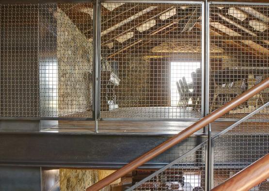 a metal railing in a loft