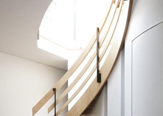 a wooden staircase with a window