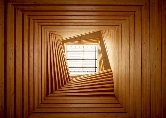 a wood staircase with a window