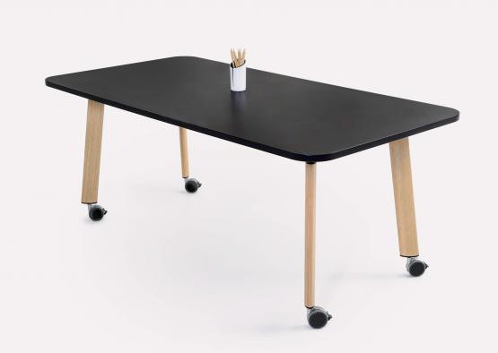 a black rectangular table with wooden legs