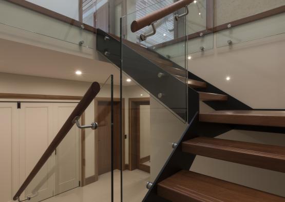 a staircase with glass railings