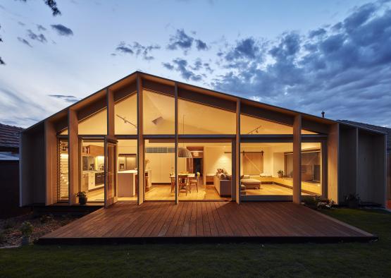 a house with a deck and a patio