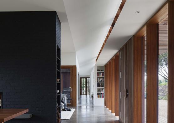 a hallway with wood and wood walls