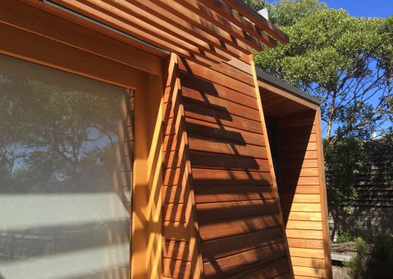 a wooden building with a window