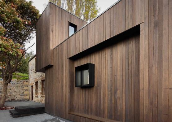 a wood building with a window