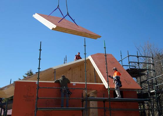 a group of people working on a building