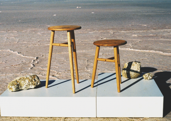 two stools on a surface