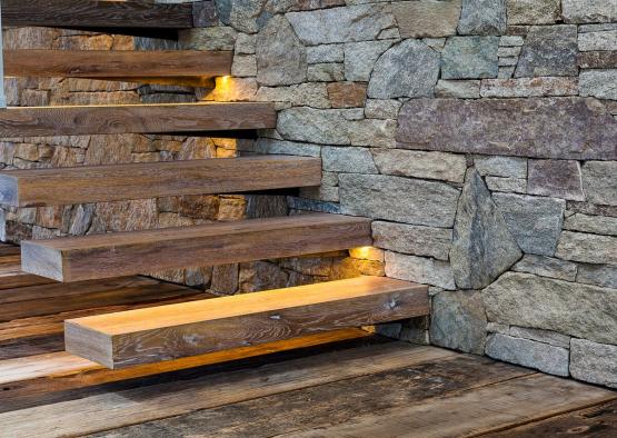 a wooden stairs with lights on