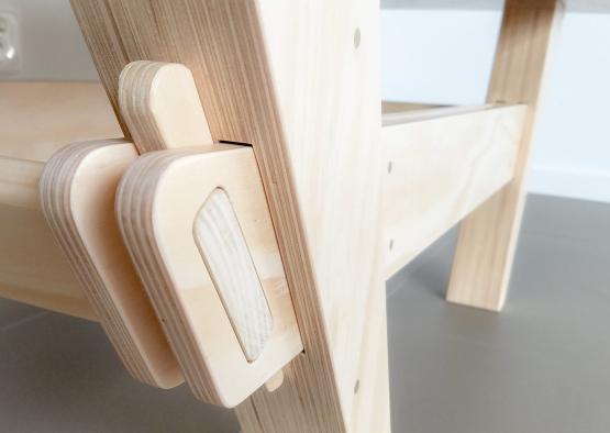 a wood table with a hinge