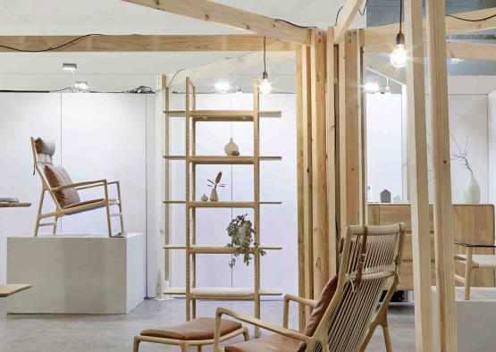 a room with a chair and shelves