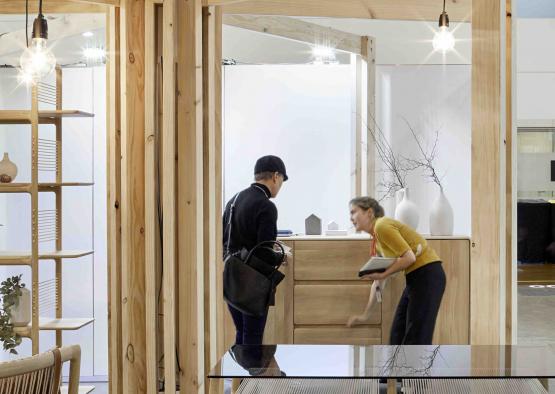 a man and woman standing in a room