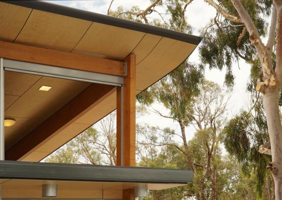 a roof of a building with trees in the background