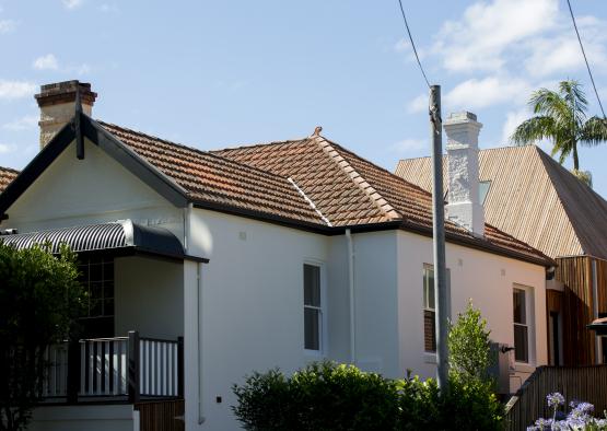 a white house with a red roof