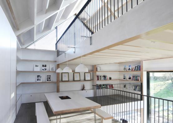 a room with a table and bench
